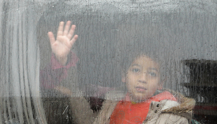 A child looks out through a window of a car, following an earthquake, in rebel-held town of Jandaris, Syria February 6, 2023. — Reuters