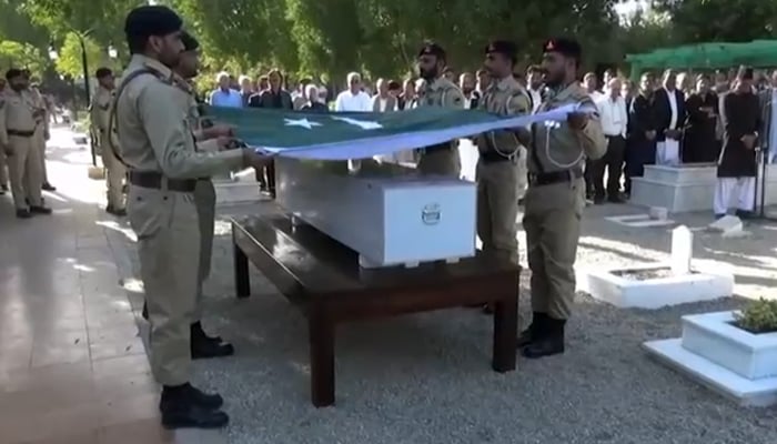 Former president Pervez Musharrafs last rites being performed in Karachi on February 7, 2023, in this still taken from a video. — ISPR