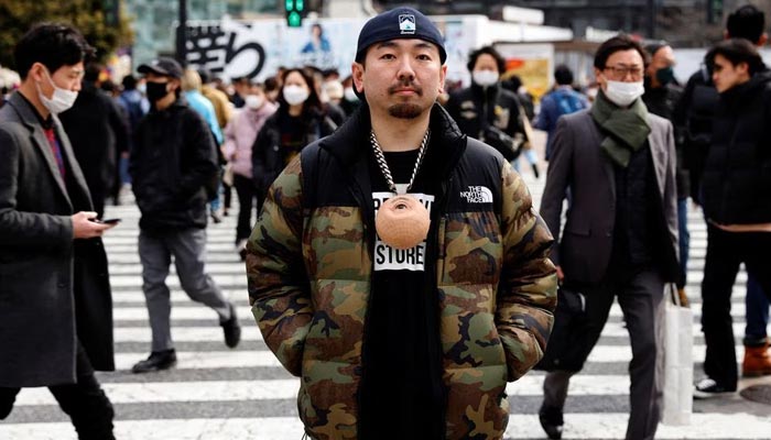 Masataka Shishido, also known as DJ Doooo, poses with his hyper realistic flesh-like object eye dice in Tokyo, Japan February 2, 2023. — Reuters
