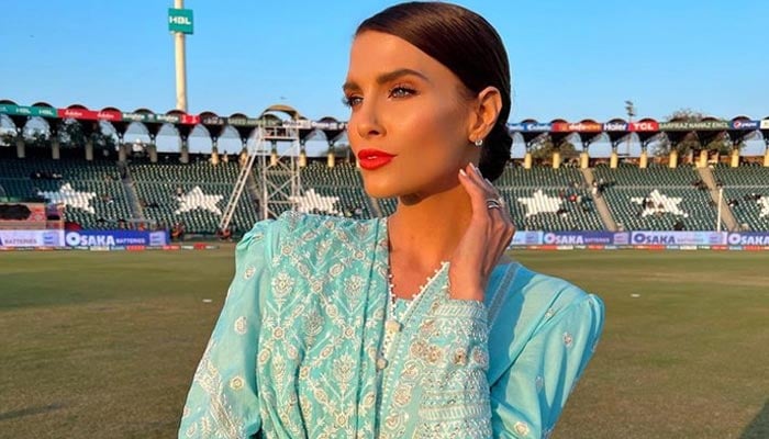 Australian cricket presenter Erin Holland posing in Gaddafi Stadium, Lahore during PSL 7. — Instagram/erinvholland