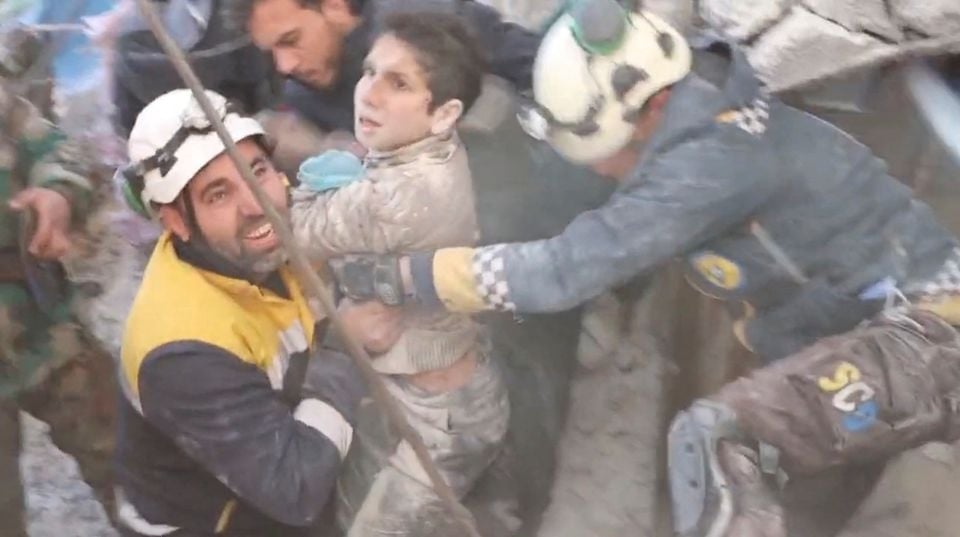 The White Helmet volunteers rescue a child from under rubble, in the aftermath of a deadly earthquake, in Jandaris, Syria February 8, 2023, in this still image obtained from a social media video.— Reuters