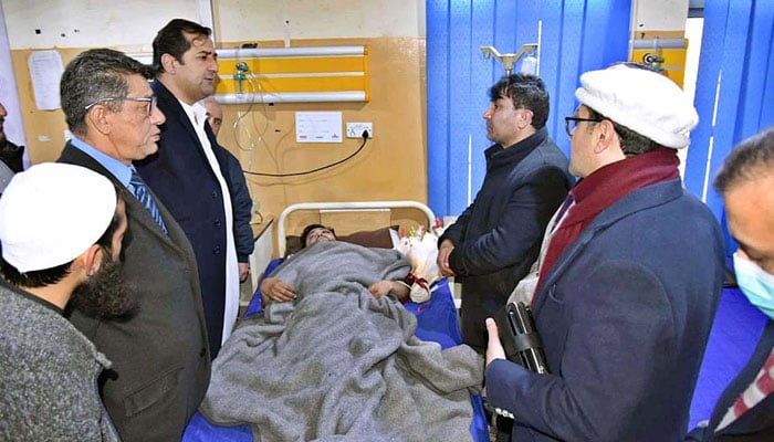 Gilgit-Baltistan Chief Minister Khalid Khurshid visiting the injured at PHQ and the City Hospital Gilgit after road accident near Kohistan on February 8, 2022. APP