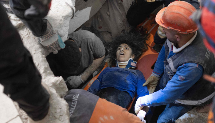 Emergency personnel conduct a rescue operation to save 16-year-old Melda from the rubble of a collapsed building in Hatay, southern Turkey, on February 9, 2023, where she has been trapped since a 7.8-magnitude earthquake struck the countrys south-east. AFP