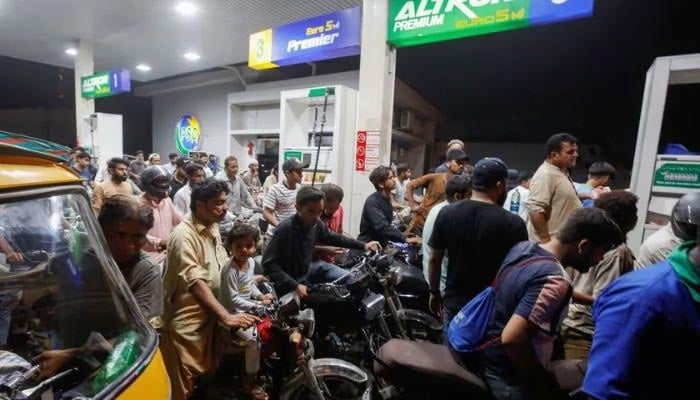 People wait their turn to get fuel at a petrol station, in Karachi, Pakistan June 2, 2022. Picture taken June 2, 2022.— Reuters