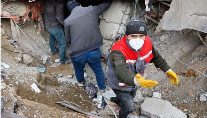 People search for survivors at the site of a collapsed building, in the aftermath of a deadly earthquake in Kahramanmaras, Turkey February 10, 2023.— Reuters