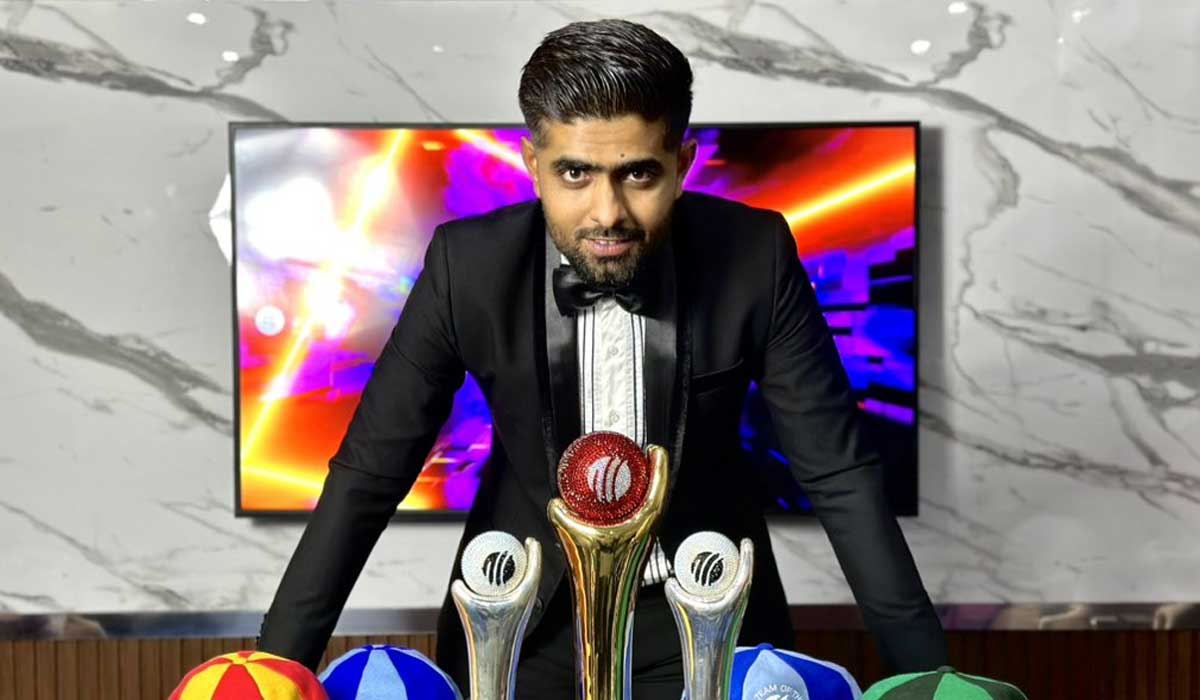 Babar Azam poses with his ICC trophies. — Twitter/@babarazam258
