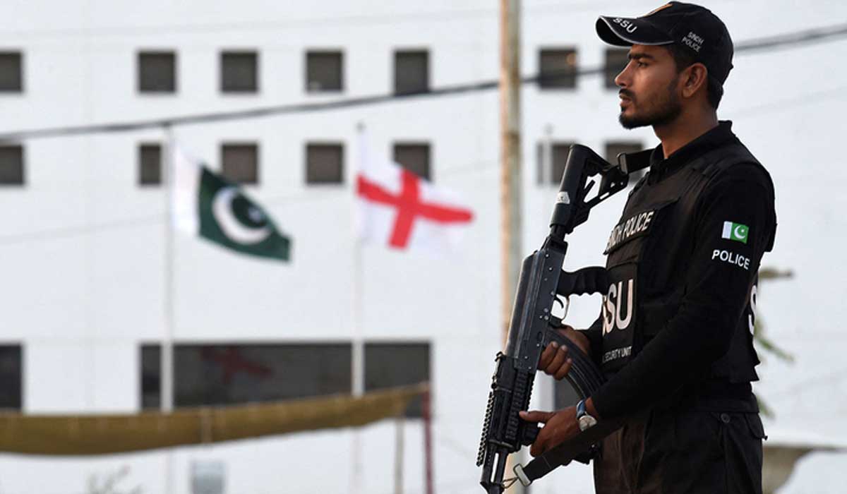A member of security personnel stands guard upon the arrival of Englands and Pakistans cricket players and team officials at the National Cricket Stadium for their practice sessions on the eve of their first T20 international cricket match in Karachi on September 19, 2022. — AFP
