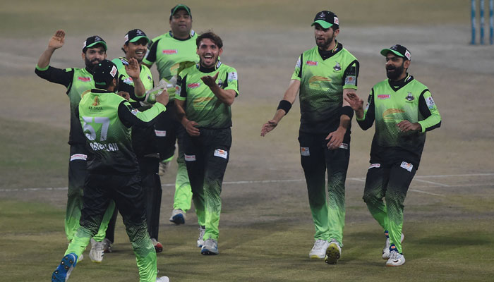Lahore Qalandars players celebrate after the dismissal of Multan Sultans Rilee Rossouw (unseen) during the PSL T20 final cricket match on February 27, 2022. — AFP