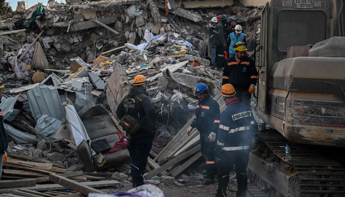 Germanys death-care team search through the rubble of collapsed buildings in Kahramanmaras on February 12, 2023. — AFP
