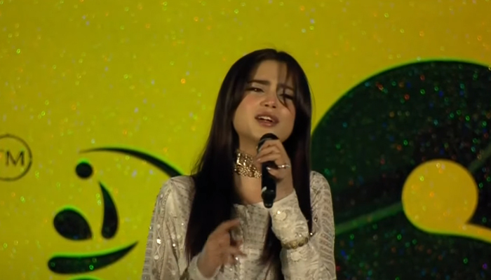 Aima Baig sings the national anthem during the opening ceremony of the PSL 8 in Multan on February 13, 2023, in this still taken from a video. — YouTube/GeoNews