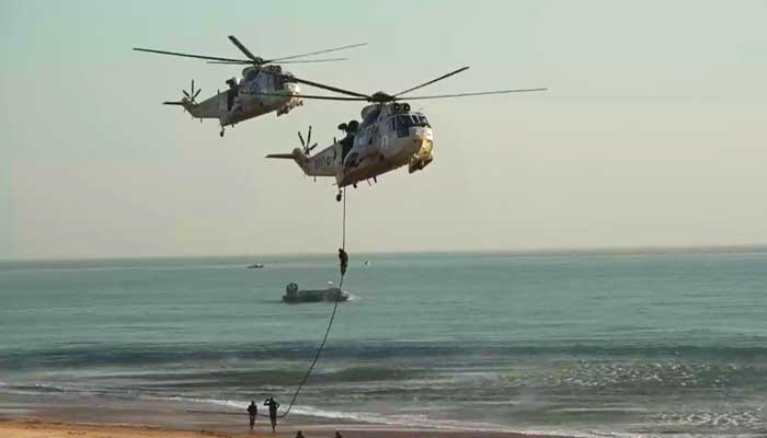 Marine troops perform an exercise during the ongoingPakistan Navy’s eighth Multinational Maritime Exercise AMAN-2023