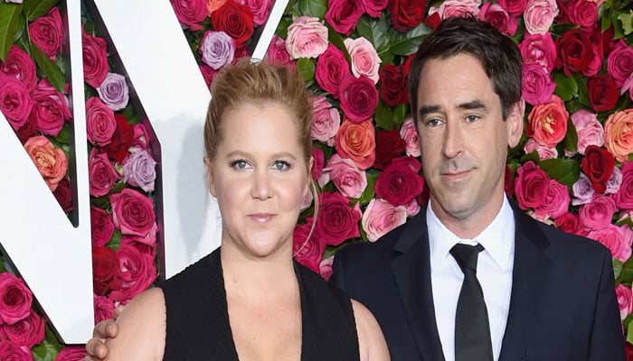 Amy Schumer celebrated fifth wedding anniversary by sharing a blurry photo with husband Chris Fischer