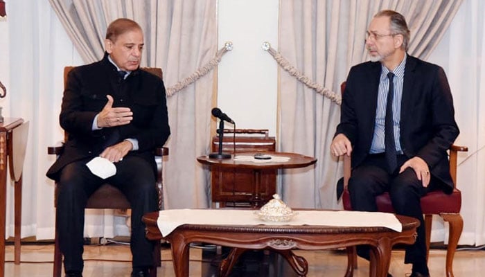 Prime Minister Shehbaz Sharif offers condolences to Turkish ambassador to Pakistan over the loss of life and property in the recent earthquake in the country during his visit to the embassy in Islamabad on February 13. — PID