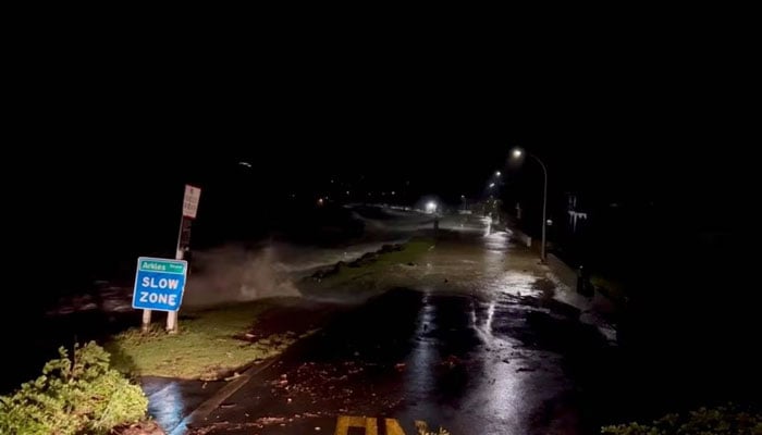 A view shows high tides rising due to Cyclone Gabrielle in Arkles Bay, Auckland, New Zealand February 13, 2023 in this screen grab obtained from a social media video. REUTERS