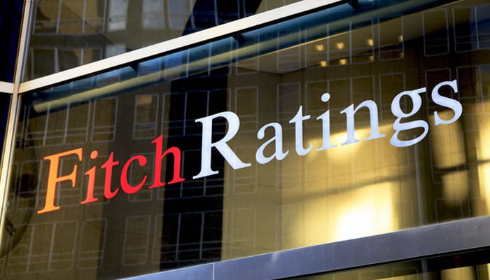 The logo of Fitch Ratings can be seen above the main entrance of their office building. — Reuters/File