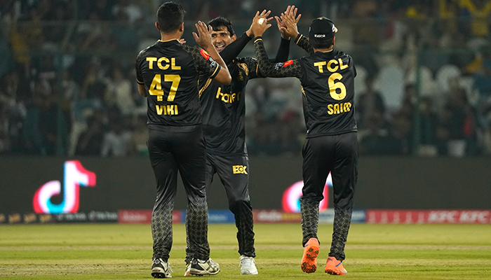 Peshawar Zalmi players celebrate after taking a wicket during their match against theKarachi Kings at theNational Bank Cricket Arena in Karachi, on February 14, 2023. — PSL