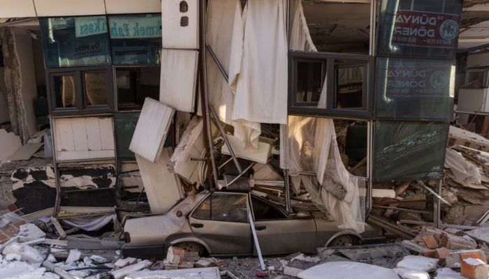 A destroyed car is seen in the aftermath of a deadly earthquake in Elbistan, Turkey February 14, 2023.— Reuters