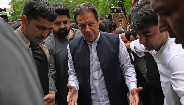 PTI Chairman Imran Khan arrives to appear before a court in Islamabad. —AFP/File