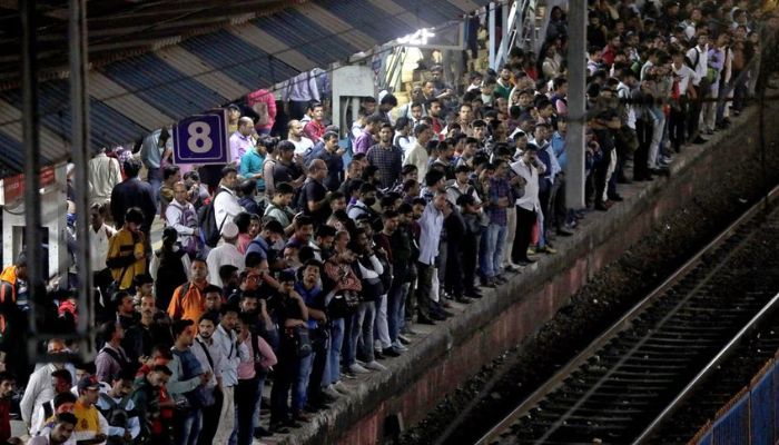 Commuters crowd on a platform as they wait to board suburban trains at a railway station in Mumbai, India, January 20, 2023.— Reuters
