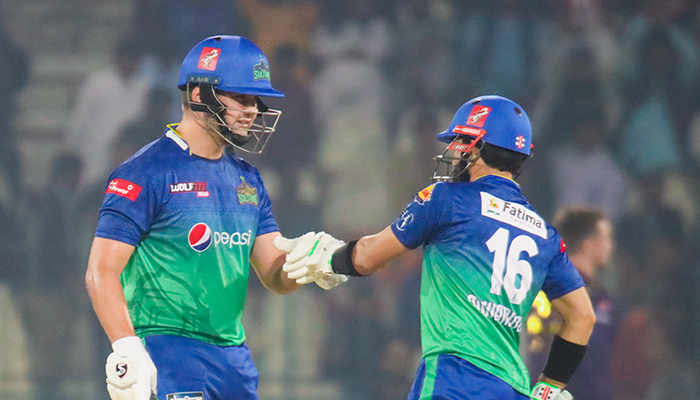 Multan Sultans Rilee Rossouw (left) and Mohammad Rizwan bump fists during the third match of the ongoing eighth edition of the Pakistan Super League (PSL) at the Multan Cricket Stadium on February 15, 2023. — PSL