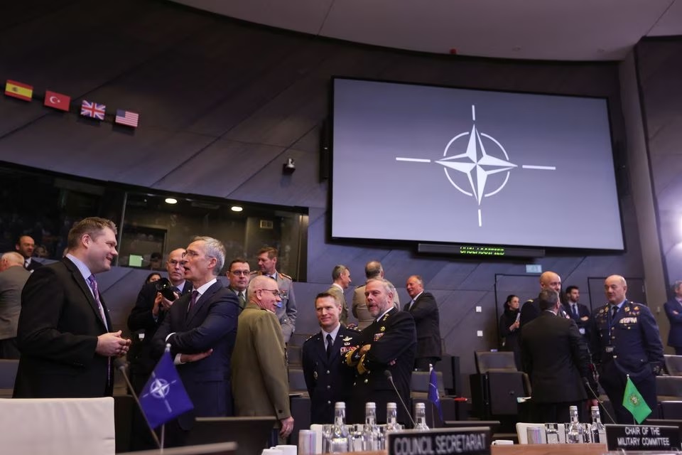 Finlands Defence Minister Mikko Savola talks with NATO Secretary General Jens Stoltenberg as they attend a NATO defence ministers meeting at the Alliances headquarters in Brussels, Belgium February 15, 2023.— Reuters