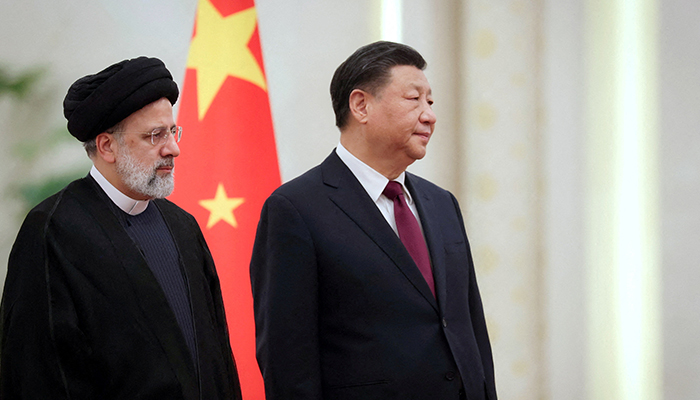 Iranian President Ebrahim Raisi stands next to Chinese President Xi Jinping during a welcoming ceremony in Beijing, China, February 14, 2023. — Reuters