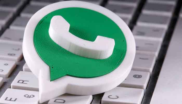 A 3D printed Whatsapp logo is placed on the keyboard in this illustration taken April 12, 2020. — Reuters