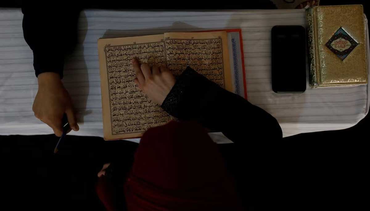 An Afghan girl recites the holy book in a madrassa in Kabul, October 8, 2022. — Reuters