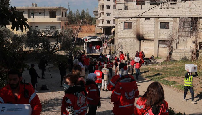 Emirates Red Crescent and Syrian Red Arab Crescent distribute boxes of humanitarian aid in response to a deadly earthquake in Jableh, Syria, February 17, 2023.— Reuters
