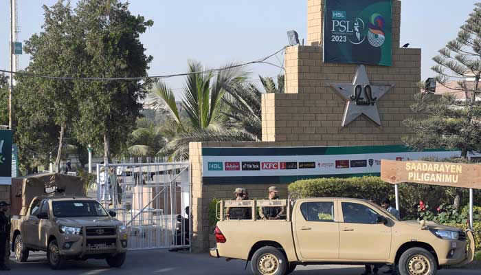 Soldiers stand guard outside the National Bank Cricket Arena during the Pakistan Super League season eights match between Karachi Kings and Peshawar Zalmi in Karachi on February 14, 2023. — Online