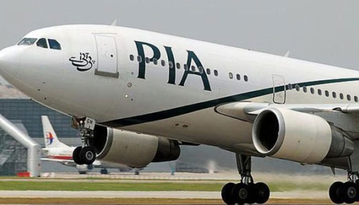 In this undated photo, a Pakistan International Airlines (PIA) passenger plane can be seen landing at an airport. — APP