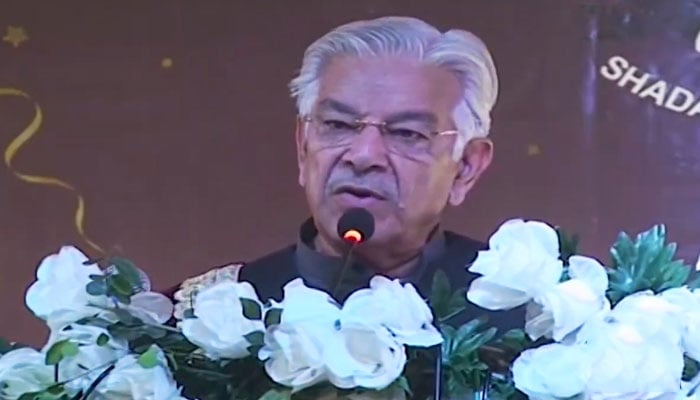 Defence Minister Khawaja Asif addresses a convention in Sialkot on February 18, 2023, in this still taken from a video. — Geo News