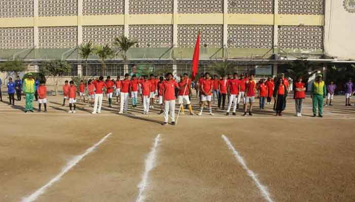 The picture shows students taking part in a sports event at St Patrick's High School in Karachi.  Press release