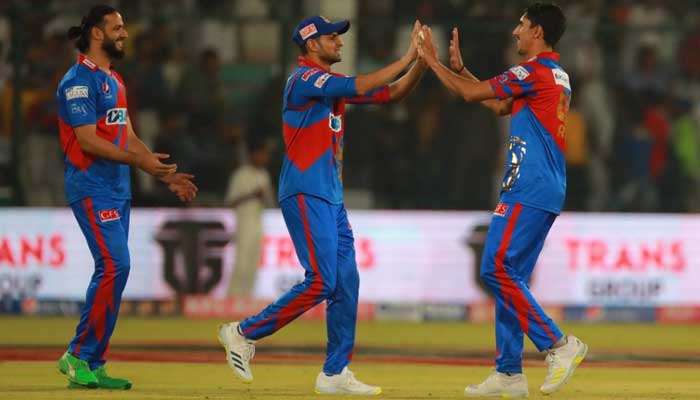 Karachi Kings skipper Imad Wasim (left) all-rounder Shoaib Malik and pacer Akif Javed celebrate their maiden win in the PSL match against Lahore Qalandars at the National Bank Cricket Arena in Karachi on February 19, 2023. — Twitter/@KarachiKingsARY