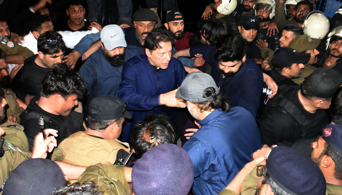 Former prime minister Imran Khan arrives at Lahore High Court to attend hearing on February 23, 2023. — Online