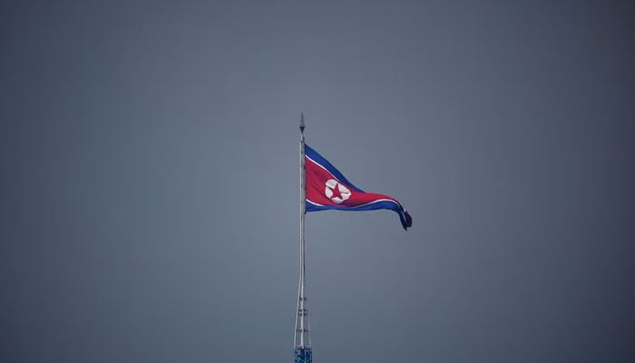 A North Korean flag flutters at the propaganda village of Gijungdong in North Korea, in this picture taken near the truce village of Panmunjom inside the demilitarized zone (DMZ) separating the two Koreas, South Korea, July 19, 2022.— Reuters