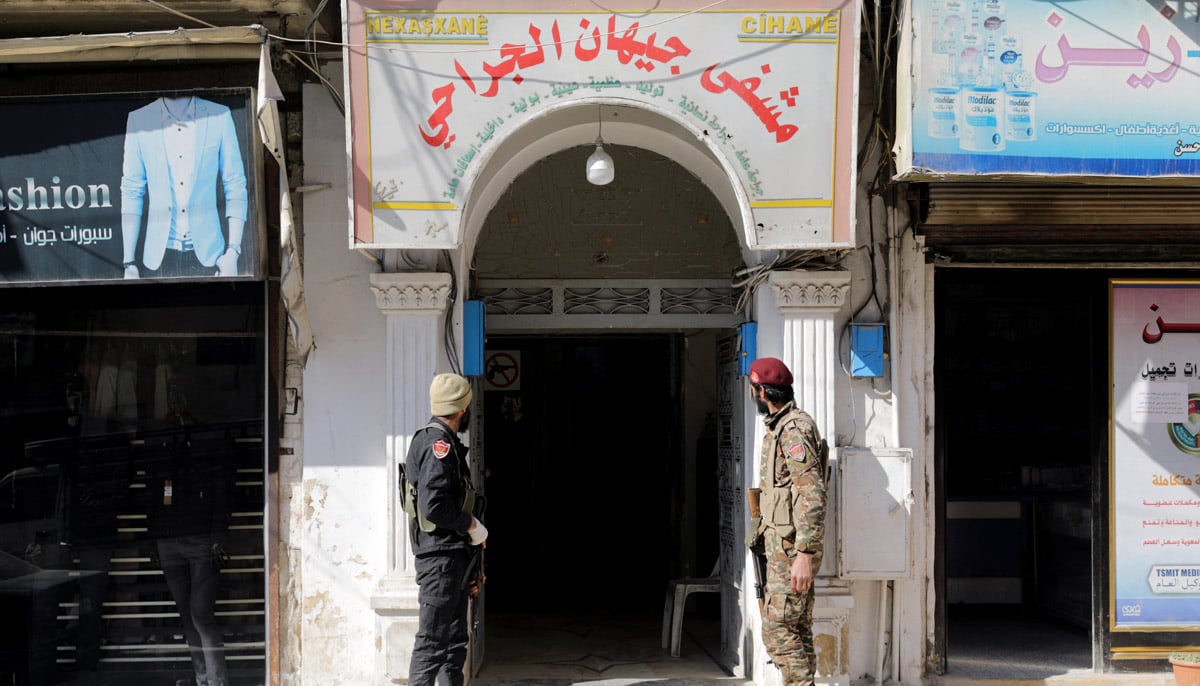 Military police officers stand guard outside the Jihan Hospital, where Afraa who, according to her relatives, was born under the rubble during a deadly earthquake earlier this month, was treated, in Afrin, Syria February 18, 2023. — Reuters