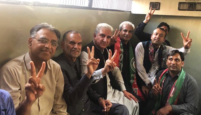 PTI leaders in a prison van during the partys Jail Bharo Tehreek (court arrest movement) in Lahore on February 22, 2023. — Twitter/@PTIOfficial