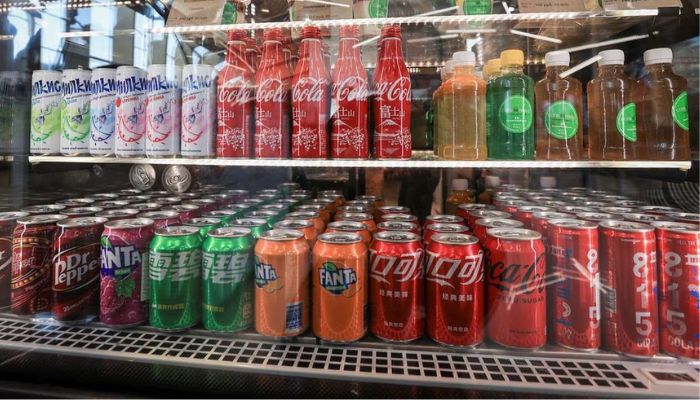 Bottles and cans of Coca Cola imported from Japan and China together with other soft drinks containers are displayed for sale in Vladivostok, Russia, February 20, 2023.— Reuters