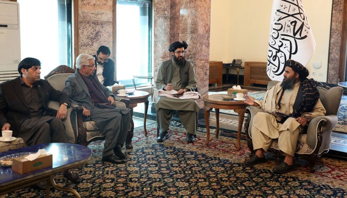 Defence Minister Khawaja Asif and DG ISI Lt Gen Nadeem Anjum in a meeting with Afghanistans acting Deputy Prime Minister Mullah Abdul Ghani Baradar. — Deputy Afghan Prime Ministers Office