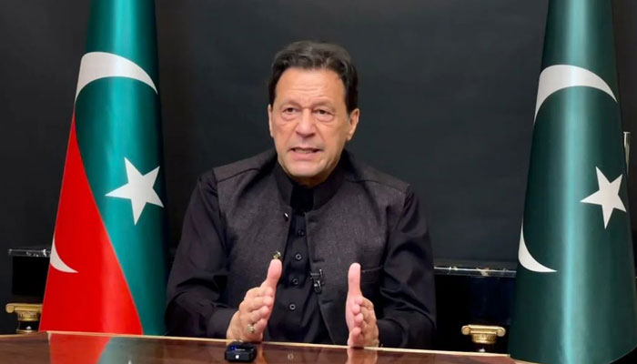 Pakistan Tehreek-e-Insaf (PTI) Chairman Imran Khan addressing party workers and supporters via video link from his residence in Zaman Link on February 22, 2023. — Instagram/imrankhan.pti