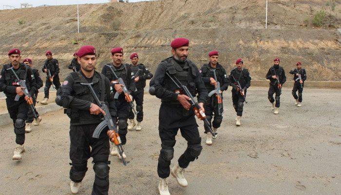 The special combat unit of the Khyber Pakhtunkhwa police while preparing for an operation. — KP Police website/File