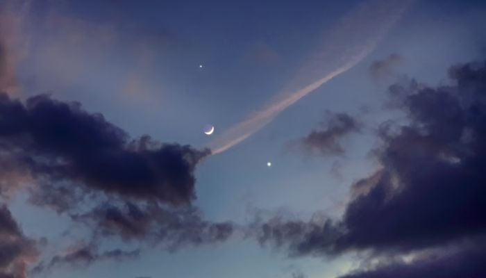 Images shows the moon, Venus, and Jupiter in rare conjunction. Twitter/peachastro