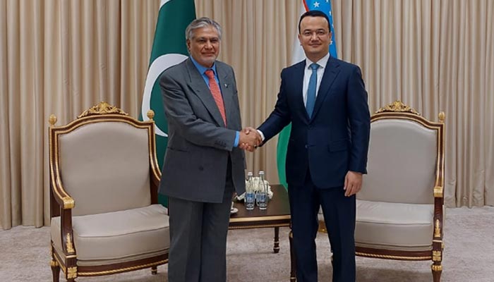 Pakistan, Uzbekistan ink $1bn agreement to boost trade 2 Federal Minister for Finance and Revenue Ishaq Dar shakes hands with Uzbekistans Minister of Investments, Industry and Trade Laziz Kudratov during the Inter-governmental Commission (IGC) held in Uzbekistan on February 24, 2022. — Photo by author