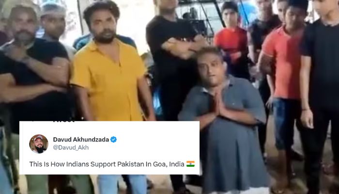 A group of men coerced the shop owner into apologising after he said he was supporting the Pakistan Cricket Team. Twitter/@ThePlacardGuy