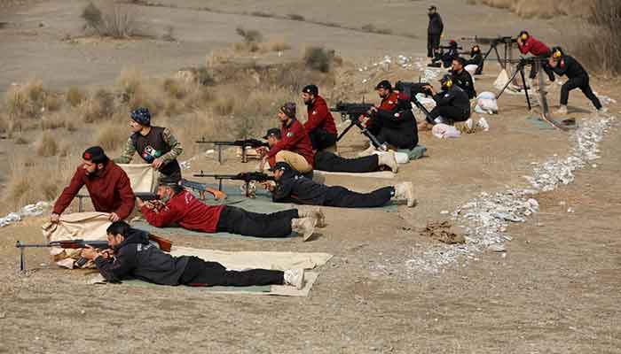 Police officers practice target shooting during a training session at the Elite Police Training Centre in Nowshera on February 10, 2023. — Reuters