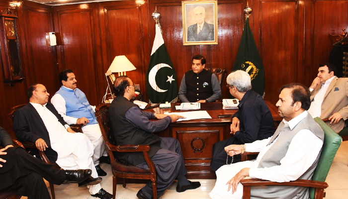 National Assembly Speaker Raja Pervaiz Ashraf (centre) speaks to PTI leaders during a meeting in Islamabad on February 27, 2023. — Twitter/NAofPakistan