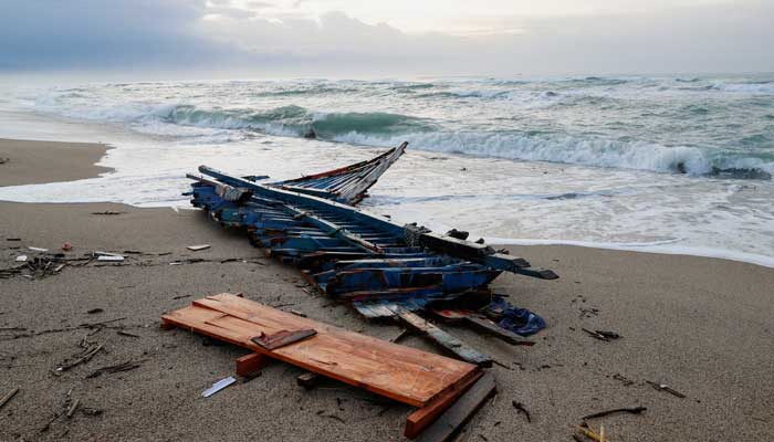 A view of the wreckage of a shipwreck in southern Italy which has left dozens of migrants dead after the boat in which they were travelling smashed onto the rocks, in Cutro, Italy, February 27, 2023. — Reuters