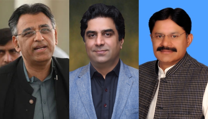پاکستان تحریک انصاف (پی ٹی آئی) کے جنرل سیکریٹری اسد عمر (ل)، پی ٹی آئی رہنما علی نواز اعوان (سی) اور راجہ خرم شہزاد نواز (ر)۔  — اے ایف پی/این اے ویب سائٹ