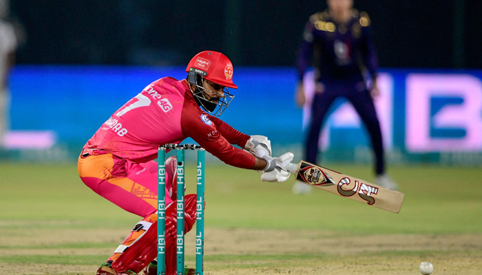 Islamabad Uniteds captain Shadab Khan while taking a shot during the PSL cricket match between Peshawar Zalmi and Islamabad United at the National Stadium in Karachi on February 23, 2023. — AFP